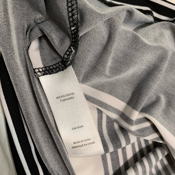 Silver buckle cinches at waist. Sleeveless black & White striped tunic in medium - Picture 7 of 8